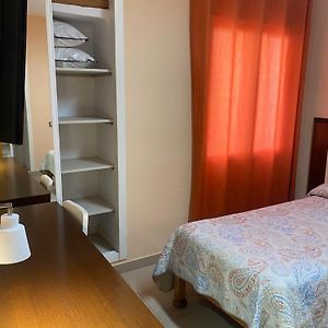 Habitación con 2 Camas Individuales